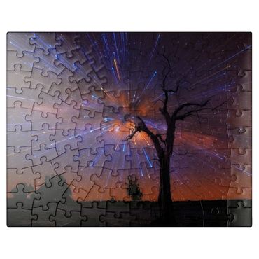 puzzleplate Radiant Starburst Sky over Lone Tree at Night 100 Jigsaw Puzzle