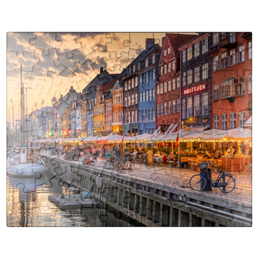puzzleplate Evening atmosphere at the canal Nyhavn in the district Frederiksstaden 100 Jigsaw Puzzle
