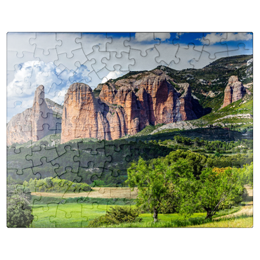 puzzleplate Rock formation Los Mallos de Riglos at the mountain village Riglos in Sierra de Loarre 100 Jigsaw Puzzle