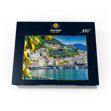Panoramic view of beautiful Amalfi on hills leading down to the coast, Campania, Italy. Amalfi Coast is the most popular travel and vacation destination in Europe. Ripe yellow lemons in the foreground. 1000 Jigsaw Puzzle box view1