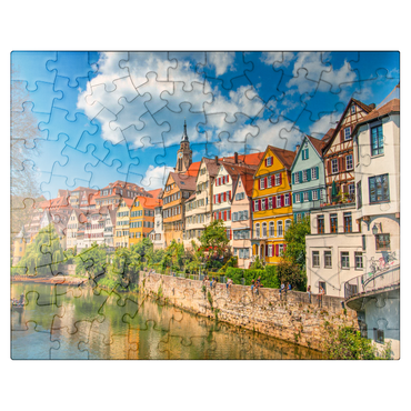puzzleplate Tübingen in Stuttgart, Germany Colored house on the river bank and blue sky. Beautiful old city in Europe. People sitting on the wall. Boats made of wood attached to the dock. 100 Jigsaw Puzzle
