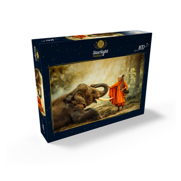 Monk hiking with the fancy elephant in the forest. 100 Jigsaw Puzzle box view1