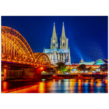 puzzleplate Night view of Cologne Cathedral and Hohenzollern Bridge over Rhine, Germany 300 Jigsaw Puzzle