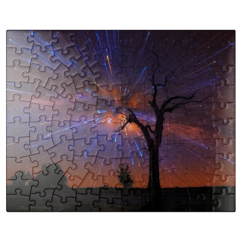 puzzleplate Radiant Starburst Sky over Lone Tree at Night 100 Jigsaw Puzzle