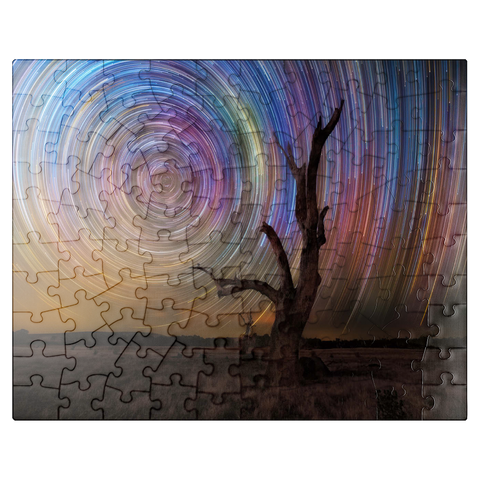 puzzleplate Colorful Star Trails Above Barren Tree - Night Sky Spiral 100 Jigsaw Puzzle