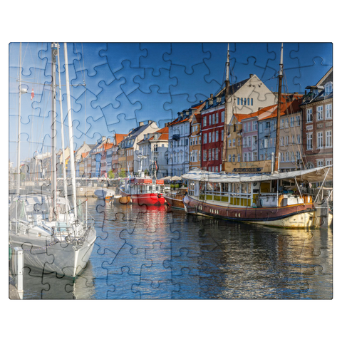 puzzleplate Boats at the branch canal Nyhavn in the district Frederiksstaden 100 Jigsaw Puzzle