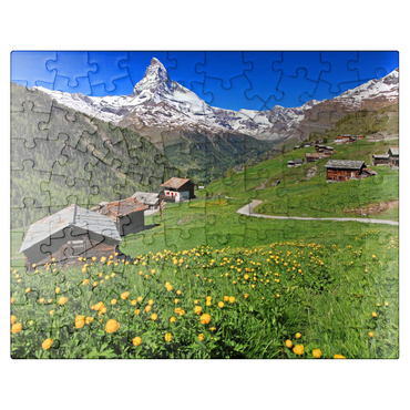 puzzleplate Spring meadow with troll flowers (Trollius europaeus) at the hamlet Findeln towards Matterhorn (4478m), Zermatt 100 Jigsaw Puzzle
