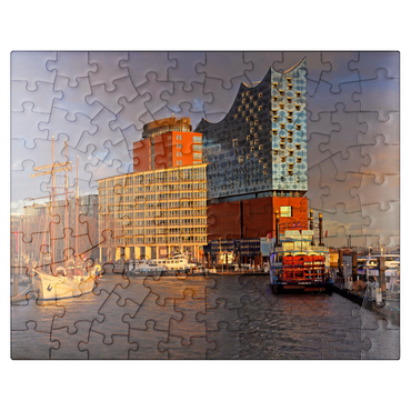 puzzleplate Ship pier at the Überseebrücke with view over the Elbe to the Elbphilharmonie in the HafenCity, Hamburg, Germany 100 Jigsaw Puzzle