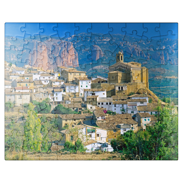puzzleplate Mountain village Murillo de Gallego against Los Mallos de Riglos in the Sierra de Loarre 100 Jigsaw Puzzle