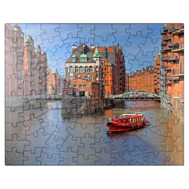 puzzleplate Moated castle between Holländischbrookfleet and Wandrahmsfleet in Speicherstadt, Hamburg 100 Jigsaw Puzzle