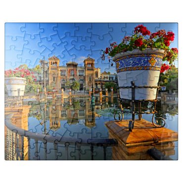 puzzleplate Water basin with the Mudejar Pavilion in the morning light, Plaza de America 100 Jigsaw Puzzle