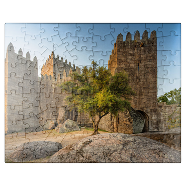 puzzleplate Romanesque fortress in Guimarães in the evening 100 Jigsaw Puzzle