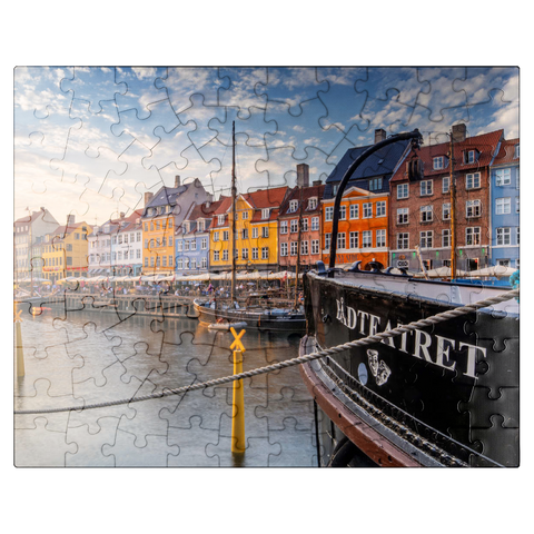 puzzleplate Evening atmosphere at the canal Nyhavn in the district Frederiksstaden 100 Jigsaw Puzzle