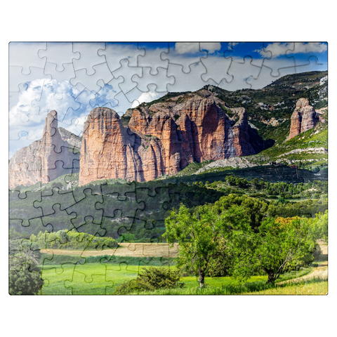 puzzleplate Rock formation Los Mallos de Riglos at the mountain village Riglos in Sierra de Loarre 100 Jigsaw Puzzle