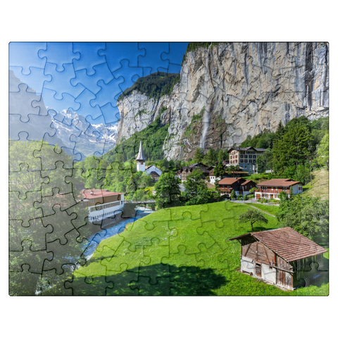 puzzleplate Place Lauterbrunnen with the Staubbach Falls 100 Jigsaw Puzzle