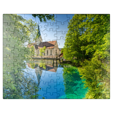 puzzleplate Monastery church at Blautopf, a karst spring in Blaubeuren, Alb-Donau district 100 Jigsaw Puzzle
