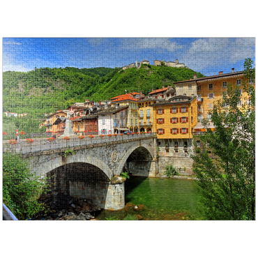 puzzleplate Bridge in the old town over the Sesia with view to Sacro Monte di Varallo in Valsesia, Italy 1000 Jigsaw Puzzle