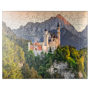 puzzleplate Royal castle against the Tannheimer mountains in the evening, Hohenschwangau near Füssen 100 Jigsaw Puzzle