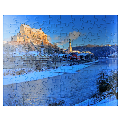 puzzleplate View over the Salzach river to the old town with castle, Heilig-Geist-Kirche and parish church St. Jakob in the morning light, Burghausen 100 Jigsaw Puzzle