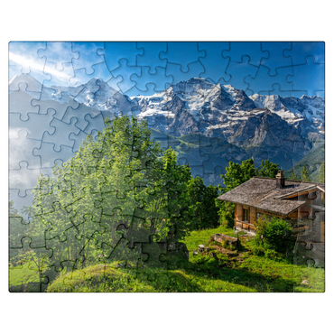 puzzleplate Isenfluh, hamlet Sulwald (1520m) hut against Eiger (3970m), Mönch (4107m) and Jungfrau (4158m) 100 Jigsaw Puzzle