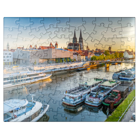puzzleplate Museum of Bavarian History on the banks of the Danube with Regensburg Cathedral in the evening 100 Jigsaw Puzzle