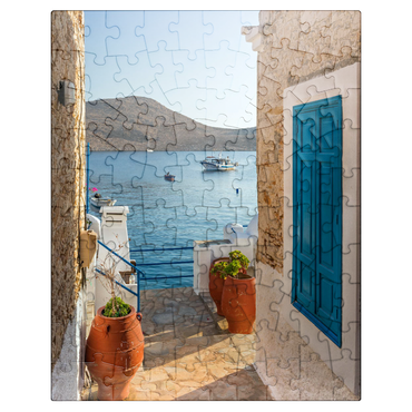 puzzleplate Alley with view to the sea in the morning, Emborios harbor village, Chalki island, Dodecanese, Greece 100 Jigsaw Puzzle