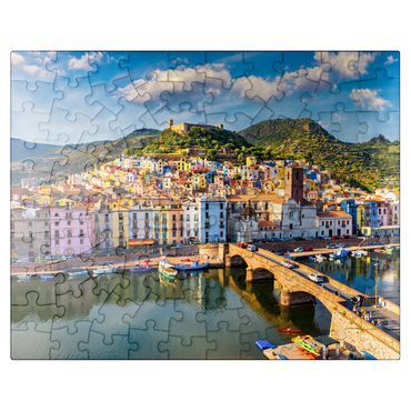puzzleplate Aerial view of beautiful village Bosa with colorful houses and medieval castle. Bosa is located in northwest Sardinia, Italy. Aerial view of colorful houses in Bosa village, Sardegna. 100 Jigsaw Puzzle