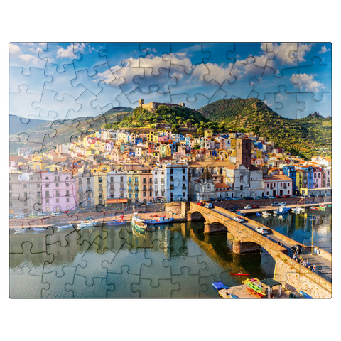 puzzleplate Aerial view of beautiful village Bosa with colorful houses and medieval castle. Bosa is located in northwest Sardinia, Italy. Aerial view of colorful houses in Bosa village, Sardegna. 100 Jigsaw Puzzle