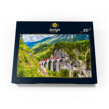 Glacier Express on the Landwasser Viaduct, Switzerland, the landmark of the Swiss Alps. The red Bernina train runs on the railroad bridge in the mountains. Aerial view of the railroad in summer. Beautiful alpine scenery 100 Jigsaw Puzzle box view1