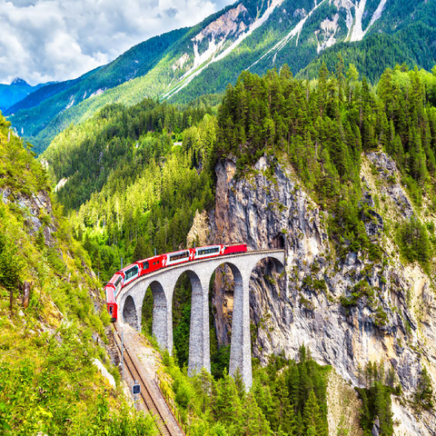 Glacier Express on the Landwasser Viaduct, Switzerland, the landmark of the Swiss Alps. The red Bernina train runs on the railroad bridge in the mountains. Aerial view of the railroad in summer. Beautiful alpine scenery 100 Jigsaw Puzzle 3D Modell