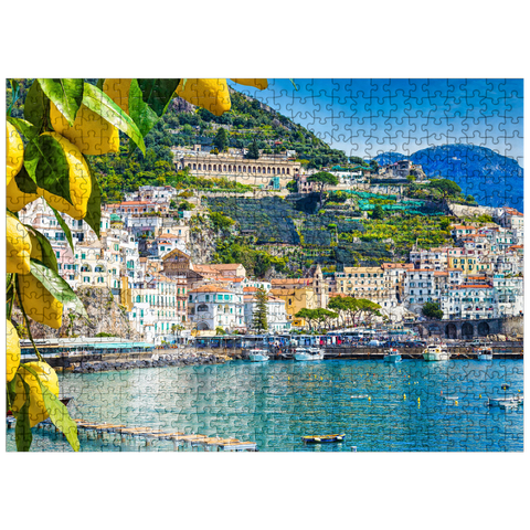 puzzleplate Panoramic view of beautiful Amalfi on hills leading down to the coast, Campania, Italy. Amalfi Coast is the most popular travel and vacation destination in Europe. Ripe yellow lemons in the foreground. 500 Jigsaw Puzzle