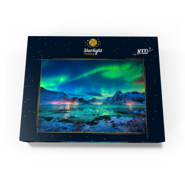 Aurora borealis over sea coast, snow covered mountains and city lights at night. Northern lights on Lofoten Islands, Norway. Starry sky with aurora borealis. Winter landscape with aurora reflected in water. 1000 Jigsaw Puzzle box view1