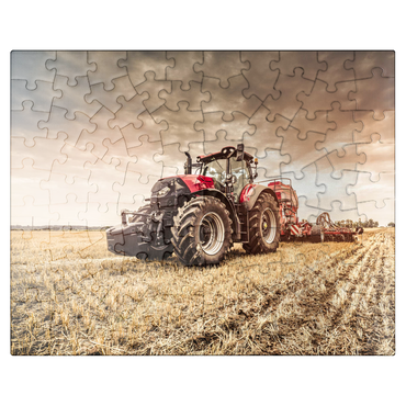 puzzleplate Modern red tractor seeding directly into the stubble, with red equipment and GPS for precision farming in the Czech Republic. 100 Jigsaw Puzzle
