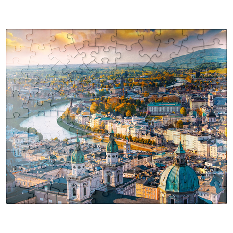 puzzleplate Beautiful panoramic view from the air in autumn season in a historic city of Salzburg with Salzach river in beautiful golden evening light and colorful autumn at sunset, Salzburger Land, Austria 100 Jigsaw Puzzle