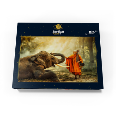 Monk hiking with the fancy elephant in the forest. 100 Jigsaw Puzzle box view1