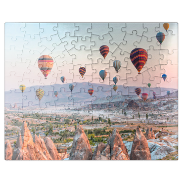 puzzleplate Hot air balloon over rocky landscape in Cappadocia Turkey 100 Jigsaw Puzzle